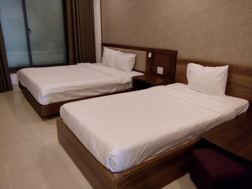 Aris Beach Apartment & Hotel Дананг Экстерьер фото